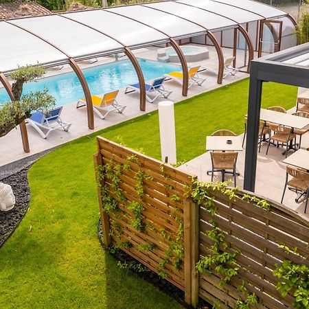 Logis Hotel Restaurant Le Clos Fleuri Кастельнодарі Екстер'єр фото