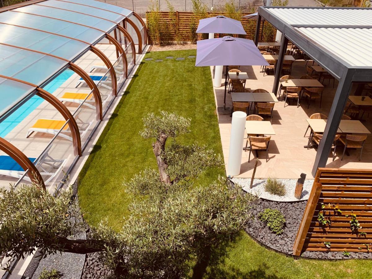 Logis Hotel Restaurant Le Clos Fleuri Кастельнодарі Екстер'єр фото