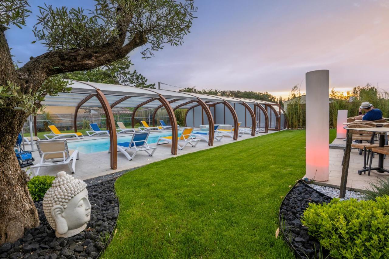 Logis Hotel Restaurant Le Clos Fleuri Кастельнодарі Екстер'єр фото