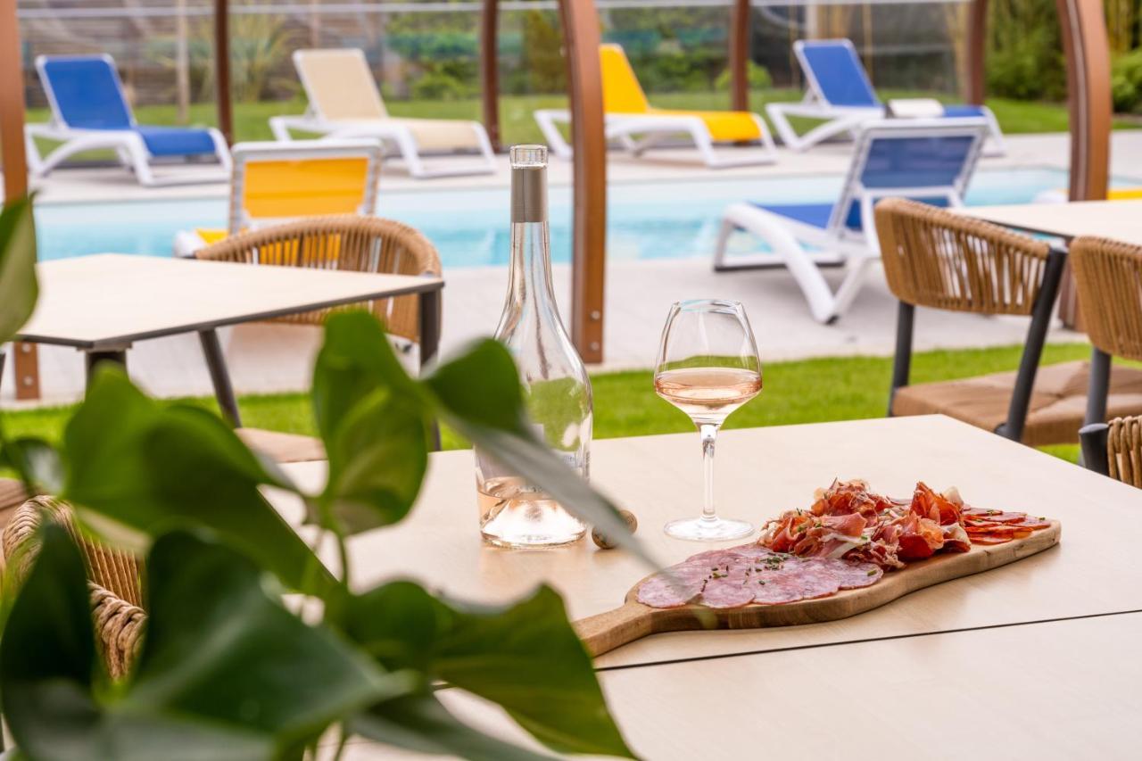 Logis Hotel Restaurant Le Clos Fleuri Кастельнодарі Екстер'єр фото
